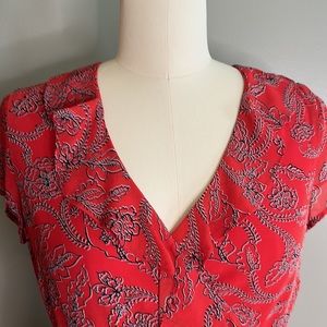 Dress. Ruffled V-neck top & down left wrap skirt. Belted. Fully lined 100% poly